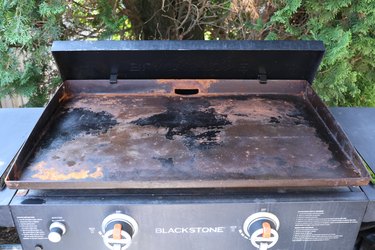 rusted and dirty flat-top grill
