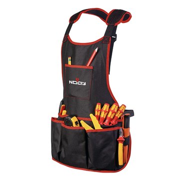 NoCry Professional Canvas Work Apron pictured against a white background. The apron is black with red trim and has many large pockets for holding tools. The center pocket has a logo on it that says "No Cry."