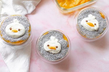 Mango chia seed pudding with cute ducks on top.