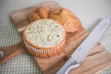 A poppy seed muffin with the muffin top cut off