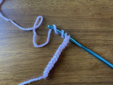 Yarn wrapped around a crochet hook