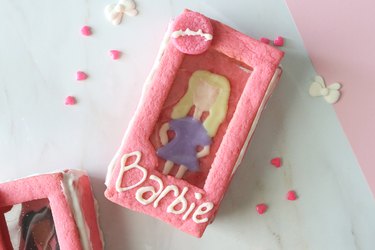 Barbie box cookies with royal icing and edible gelatin plastic