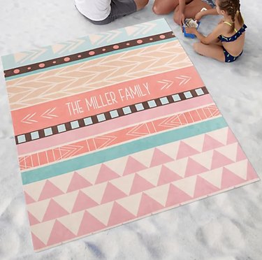 Personalized Bohemian Chic Beach Blanket in color option 'light.' Reads: 'The Miller Family.'
