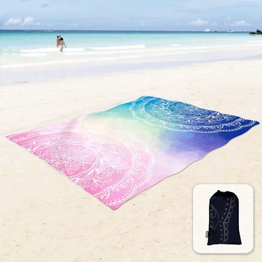 Sunlit Boho Sandproof Beach Blanket in blue pink color.