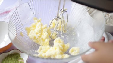 Creaming butter and granulated sugar in large mixing bowl.