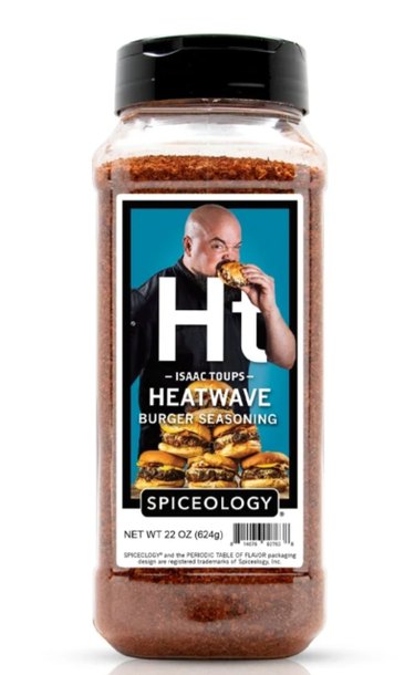 A plastic container of a deep red seasoning with a label that features the letters "Ht" and an image of the chef, a bald man in a black chef's uniform eating a burger.