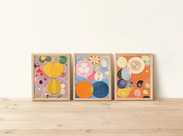 Three abstract framed artworks