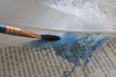 painting a feather with watercolor paint