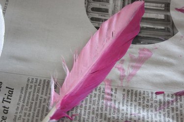 feather painted two shades of pink