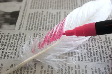 painting a feather with a marker
