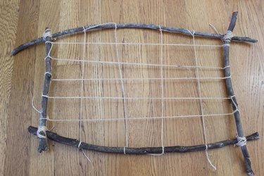 grid of twine in a loom