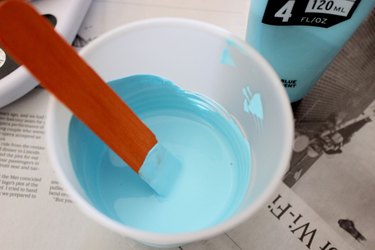 mixing paint in cup