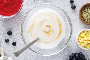 Add maple syrup and vanilla to yogurt