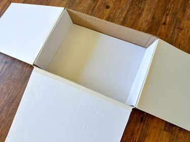 cover sides and back of box with foam board