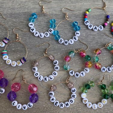 Hoop earrings with letter beads and colorful plastic beads