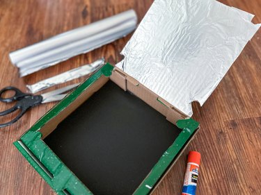 Add foil to bottom of pizza box flap