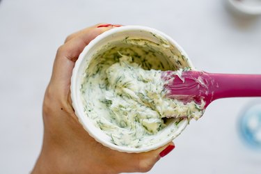 mixing dill butter.