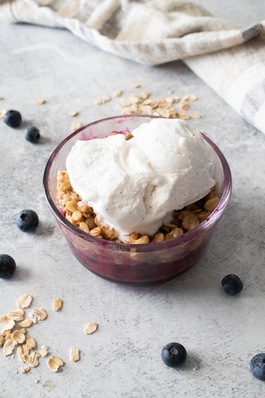 Blueberry crumble with vanilla ice cream