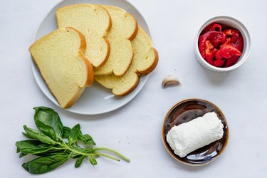 ingredients for roasted red peppers with basil goat cheese tea sandwiches