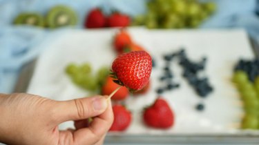 toothpick in strawberries