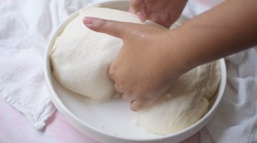 Coil-folding focaccia dough