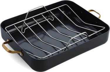 GreenPan hard-anodized aluminum roaster with V-shaped rack, shown in 3/4 view on a white ground