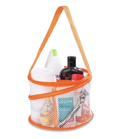 White mesh pop-up toiletry bag with bright orange trim and a long handle.