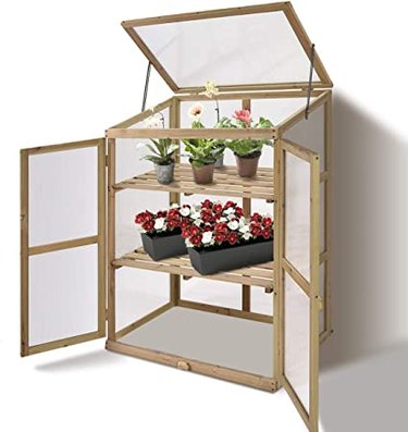 Giantex raised cold frame has two shelves to provide more space.