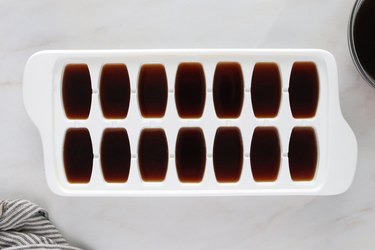 Add cold brew to an ice cube tray