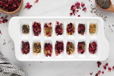 Add edible flowers to ice cube tray