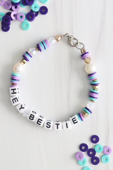 Beaded bracelet with letter beads spelling "Hey Bestie"