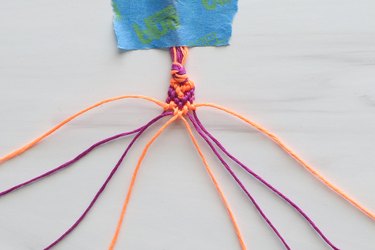 Knotting embroidery thread for a heart friendship bracelet
