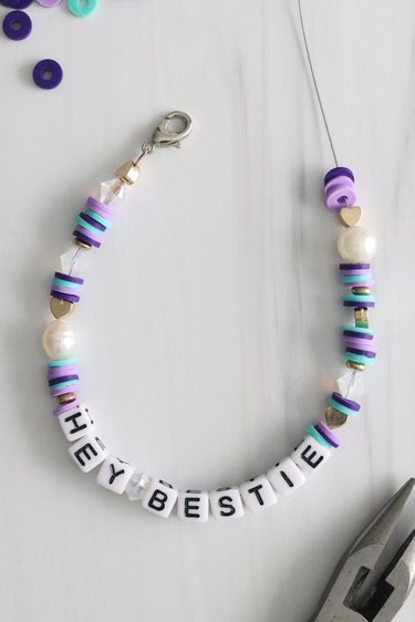 Beaded bracelet with letter beads spelling "Hey Bestie"