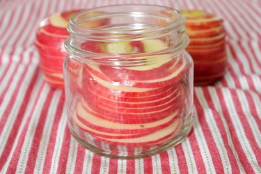 sliced apples in jar