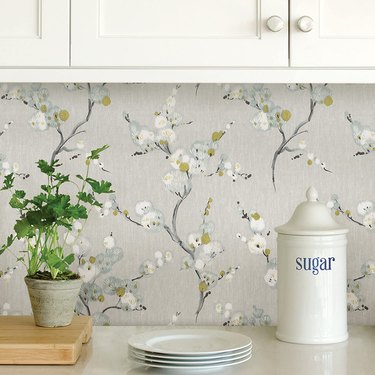 White and gray floral wallpaper in kitchen