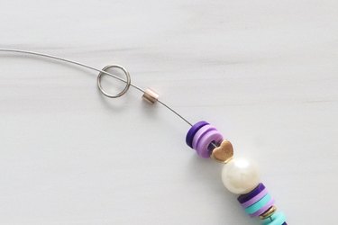 Jump ring and crimp bead at the end of a bracelet