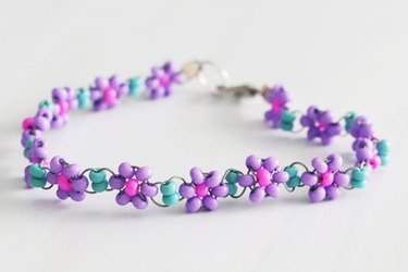 Purple, pink and turquoise beaded daisy chain bracelet