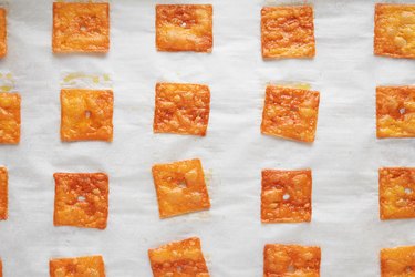 Bake cheddar cheese squares until crispy