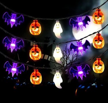 Pumpkins, Bats and Ghosts String Lights from Etsy. The bats are purple, the pumpkins are orange, and the ghosts are white. They all look friendly and not too scary for kids.