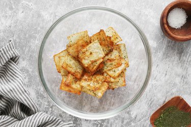 Toss provolone Cheez-Its with dried herbs and salt