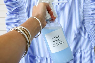 freshening clothes with homemade linen spray