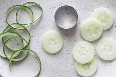 Trim cucumber slices with a circle cookie cutter