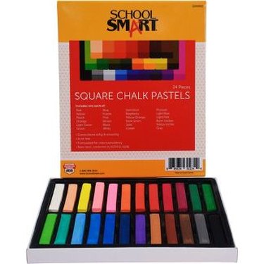 An open 24-pack of chalk pastels.