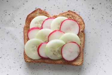 Scalloped cucumber and radish toast idea