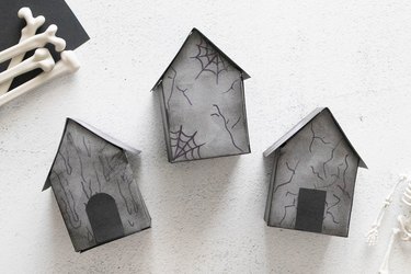 Decorated mini paper haunted houses