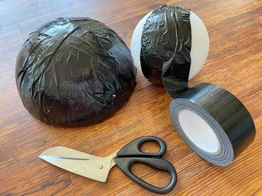 cover foam balls with black duct tape