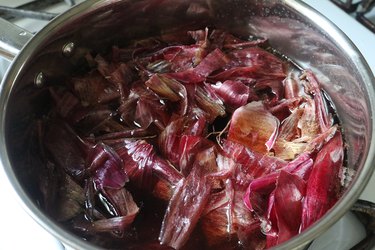 Red onion peels boiling in a pot