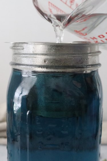 Butterfly pea tea in a jar
