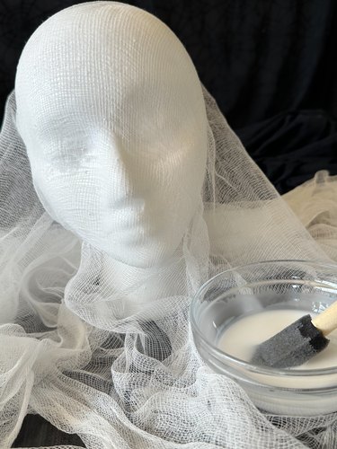 attach cheesecloth to foam head