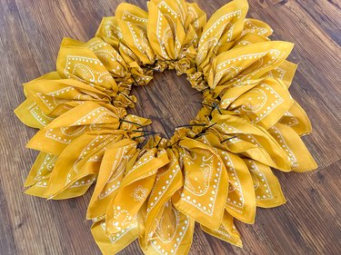 add another row of petals on inside ring of wreath using zip ties